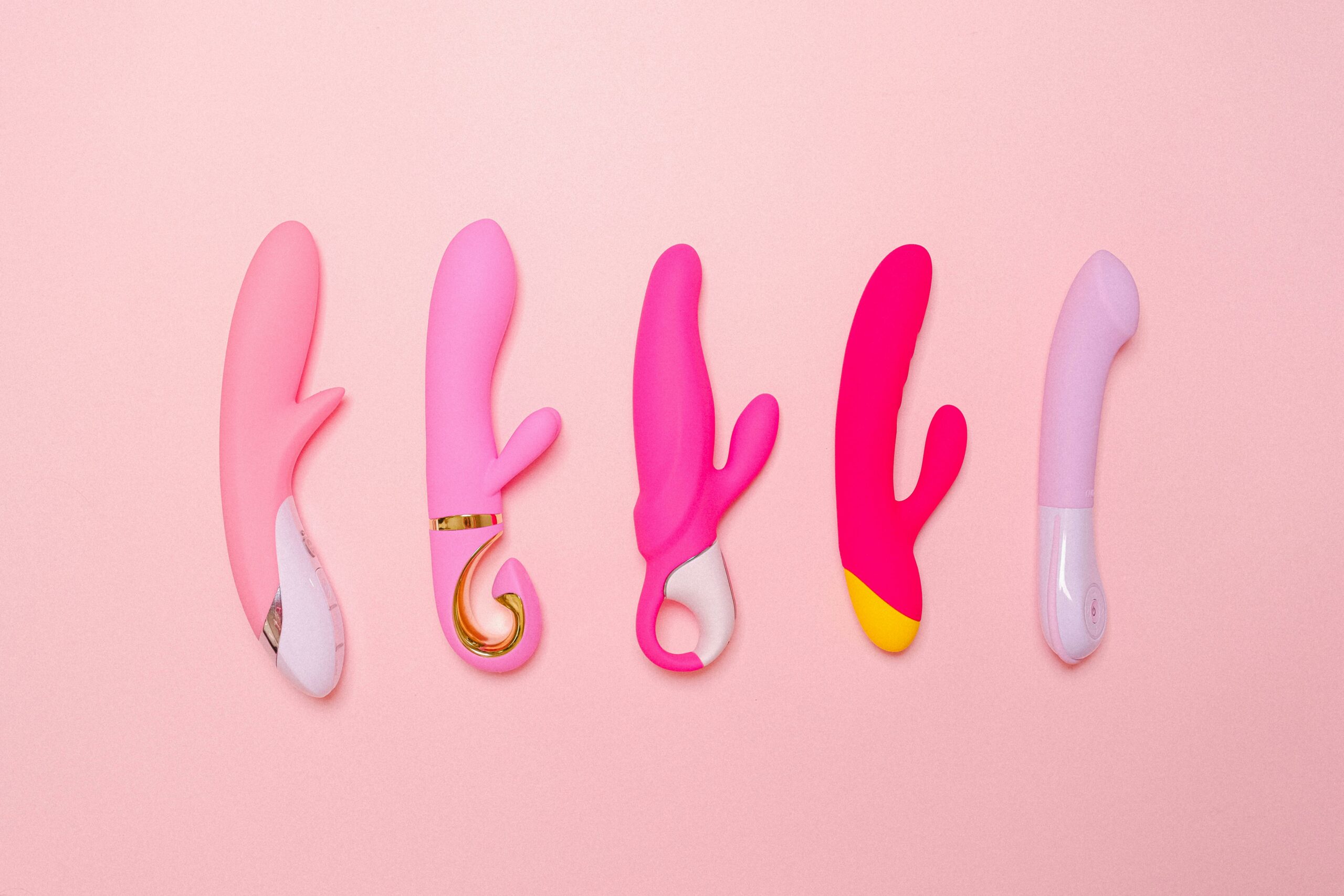 Pink background with five different vibrators